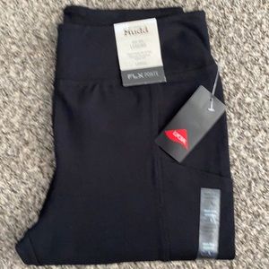 Woman’s Large high rise leggings. Two back pockets one side pocket Lycra fiber.